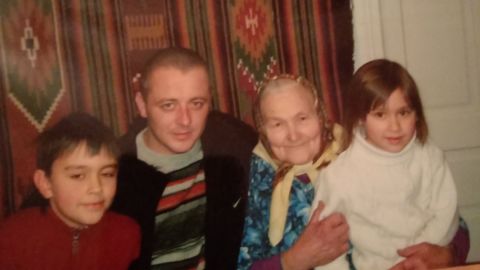 Mariya Gut, far right, when she was 5, and brother Nazar, far left, with their maternal great grandmother Katerina and an  uncle in Lviv, Ukraine.