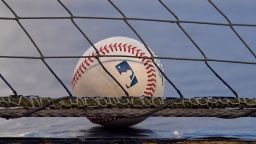 A detailed view of a Rawlings official Major League Baseball sitting on top of the dugout behind the protective netting during the game between the Cleveland Indians and the Detroit Tigers at Comerica Park on September 17, 2020 in Detroit, Michigan. The Indians defeated the Tigers 10-3.