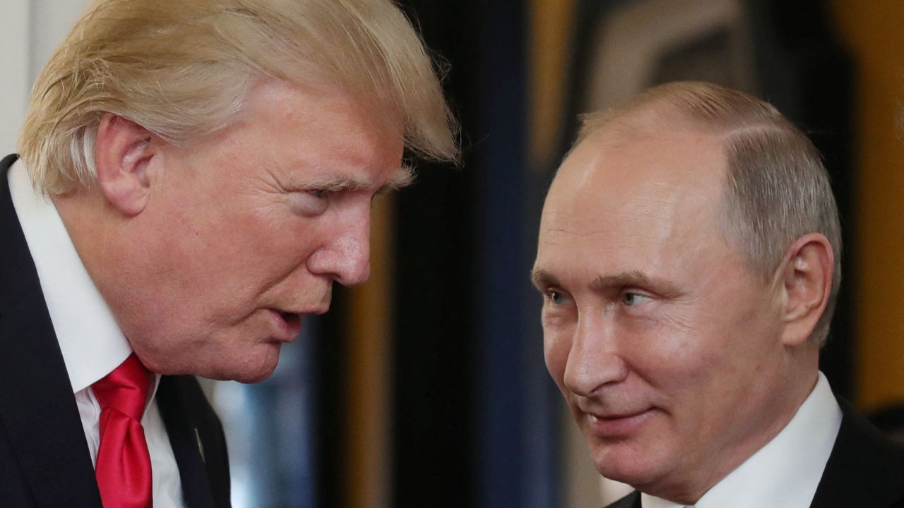President Donald Trump chats with Russia's President Vladimir Putin at a summit in 2017. 
