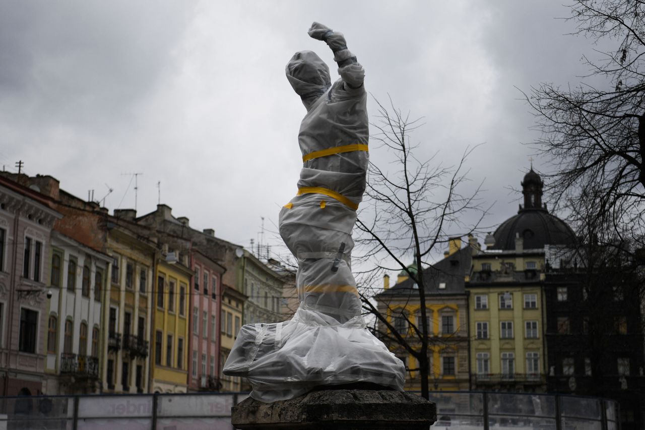 A statue is covered in Lviv on March 5. <a target=