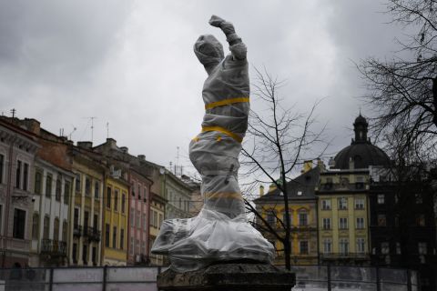 A statue is covered in Lviv on March 5. Residents wrapped statues in protective sheets to try to safeguard historic monuments across the city.