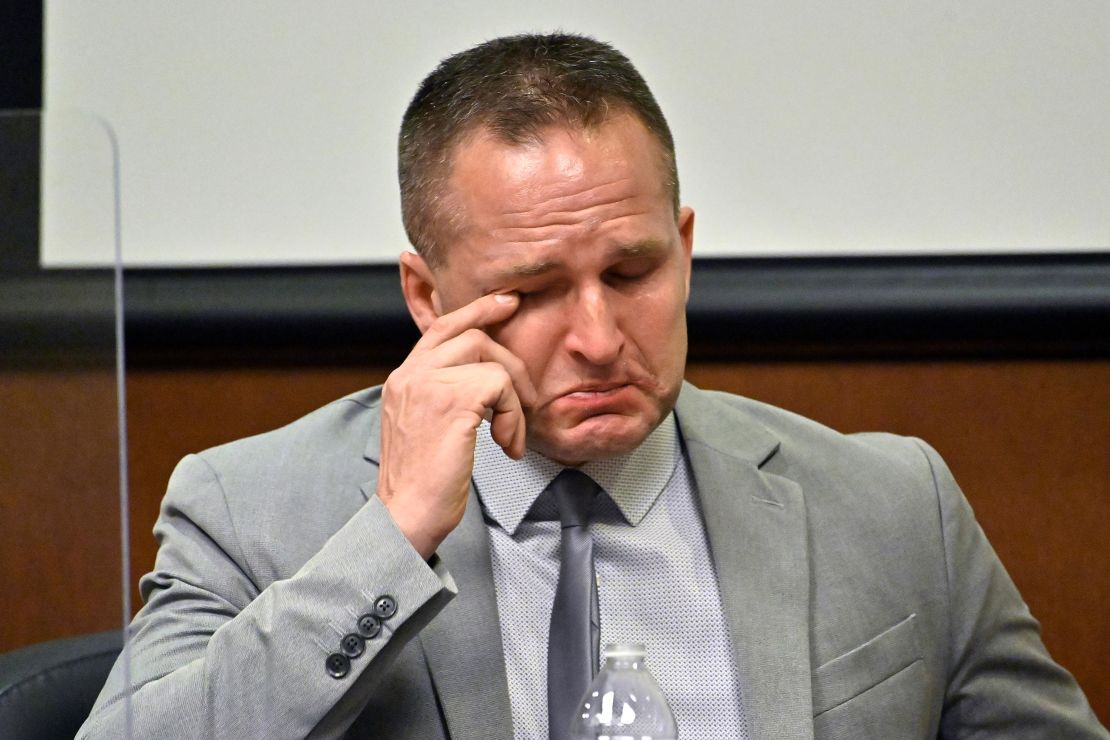 Hankison wipes a tear from his eye as he is questioned by his defense attorney on March 2, 2022, in Louisville. 