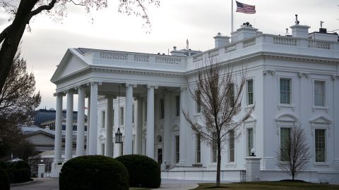 The American flag flies at half-staff at the White House on March 19, 2021 in Washington, DC.