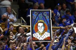 Duke Blue Devils fans hold up a sign of head coach Mike Krzyzewski of the Duke Blue Devils during the first half against the North Carolina Tar Heels at Cameron Indoor Stadium.