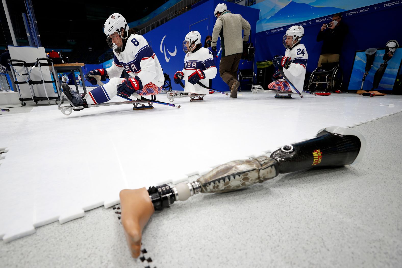 Members of the USA sled hockey team prepare for a hockey game against South Korea on March 6.