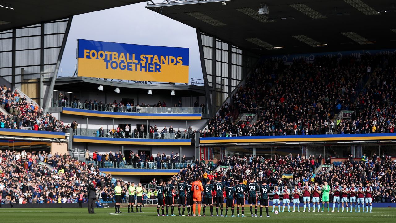 Players, officials, and fans paid respects to Ukraine ahead of the Premier League match between Burnley and Chelsea. 