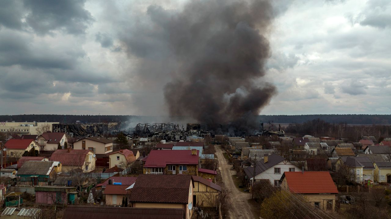 A factory and a store burn after being bombarded in Irpin, on the outskirts of Kyiv, Ukraine, Sunday, March 6, 2022.