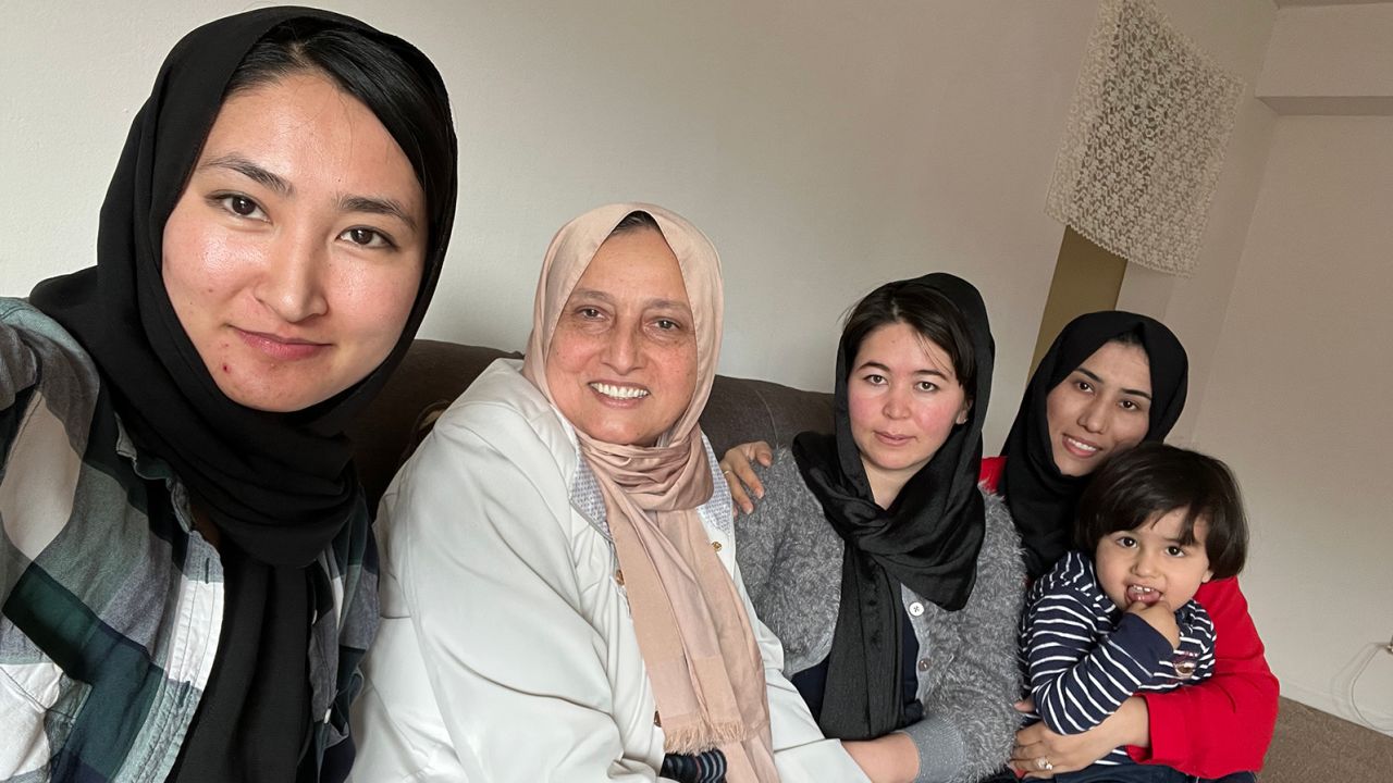 Bahrami (second from left) is pictured here with women that she is helping resettle in Indiana.
