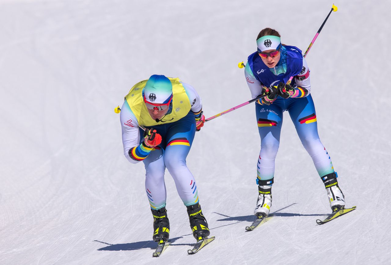 Germany's Johanna Recktenwald follows her guide, Valentin Haag, during a biathlon event on March 5.