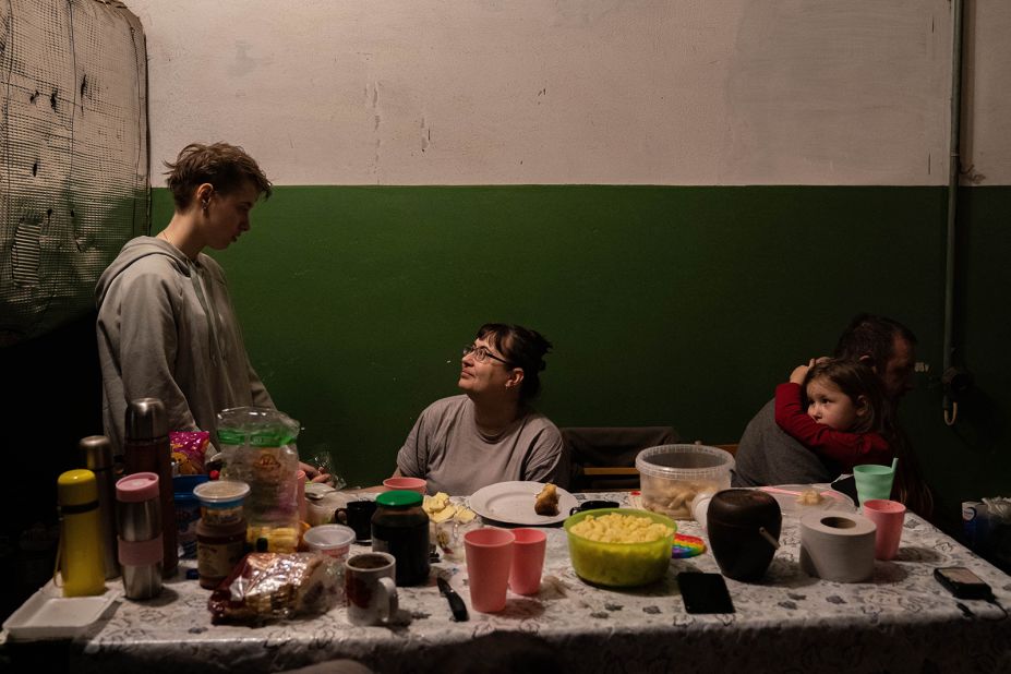 Civilians seek protection in a basement bomb shelter in Kyiv on March 6.