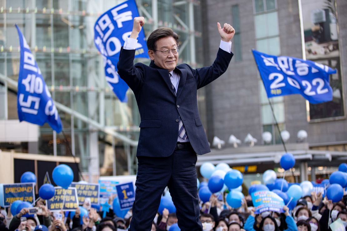 The ruling Democratic Party's presidential candidate Lee Jae-myung greets supporters on March 03.