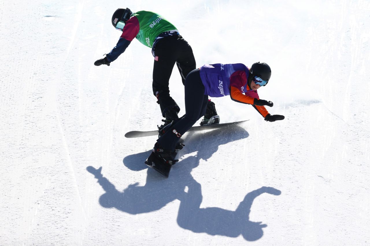 Team USA's Brenna Huckaby, left, collides with the Netherlands' Lisa Bunschoten during the snowboard cross final on Monday, March 7. Huckaby would go on to win the bronze.