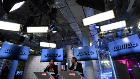 Co-owners of cable channel Dozhd (TV Rain), Natalya Sindeyeva (L) and Alexander Vinokurov  (R) attend a press conference at the channel office in Moscow , on February 4, 2014.