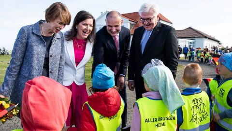 Iceland's First Lady Eliza Reid (second from left) and her husband Iceland's President Guðni Thorlacius Jóhannesson (second from right) greet school children in Reykjavik, in 2019. 