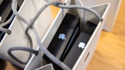 Apple iPhone 13 Pro smartphones inside a shopping bag at an Apple store in New York, U.S., on Friday, Sept. 24, 2021. 