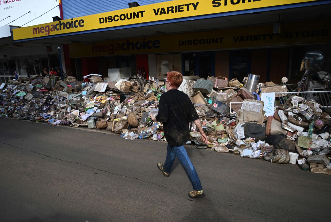 Piles of debris line a main street in Lismore, Australia, on March 4.