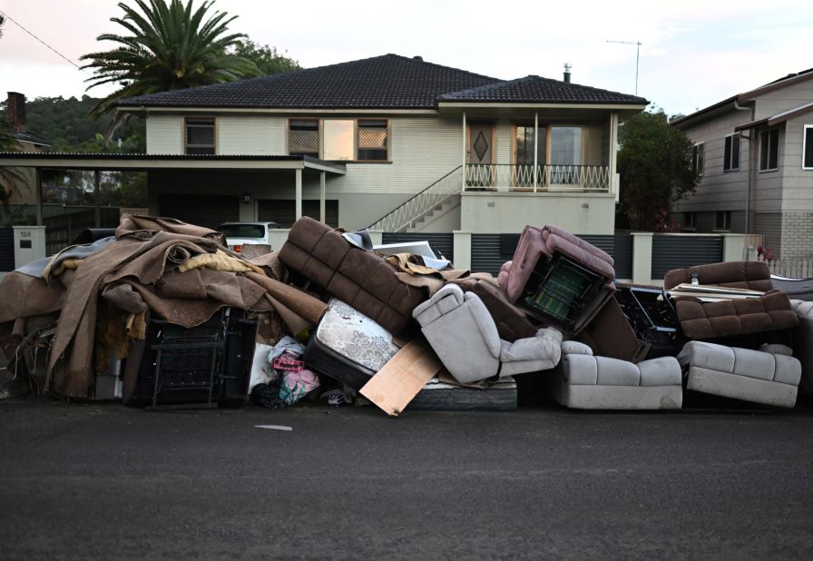 Discarded furniture sits outside in Lismore on March 2.