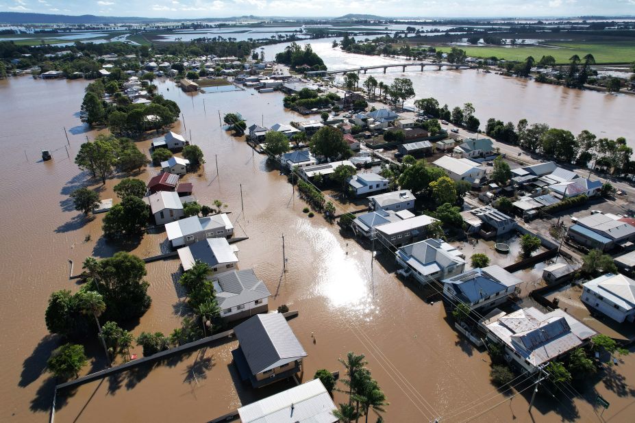 A photo taken with a drone shows houses inundated by floodwaters in Woodburn, on March 7.