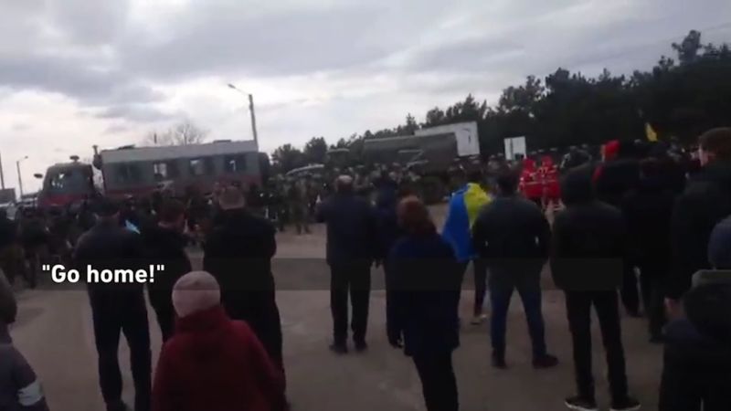 ‘Go home’: Gunfire heard as protesters stand up to Russian troops