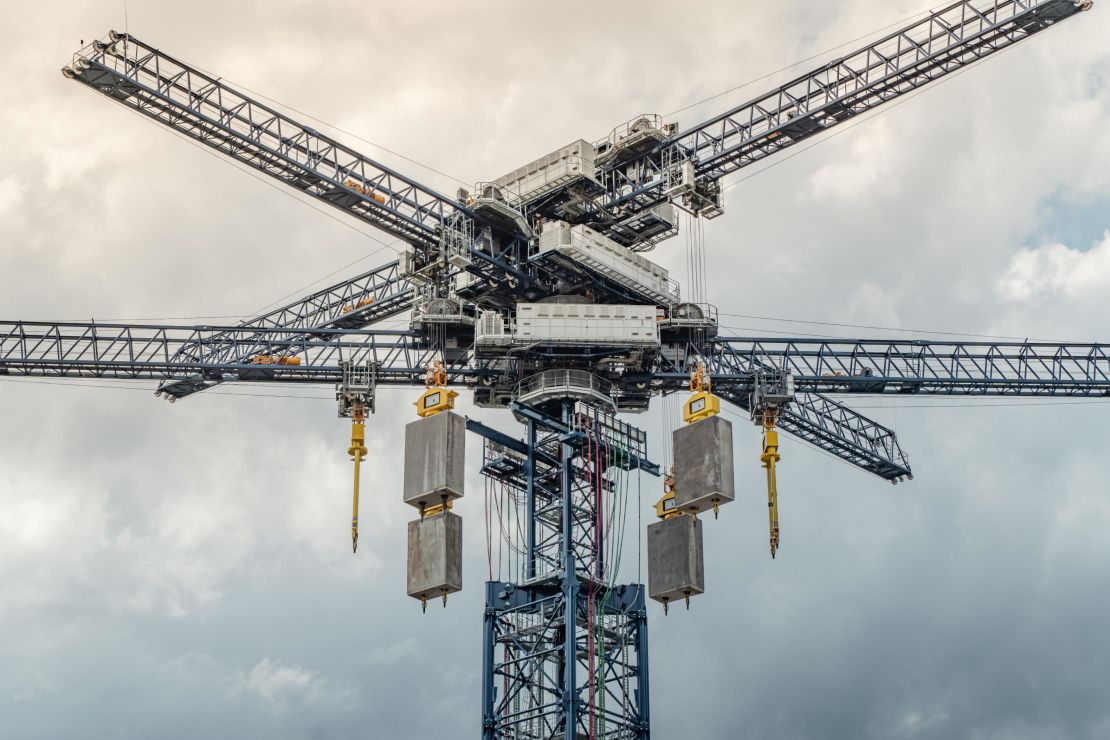 35-ton blocks, made of recycled or locally sourced materials, are raised to the top of the crane where they store energy.