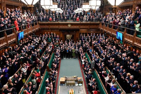 Ukrainian President Volodymyr Zelensky is displayed on a screen as he addresses British lawmakers via video on March 8. 