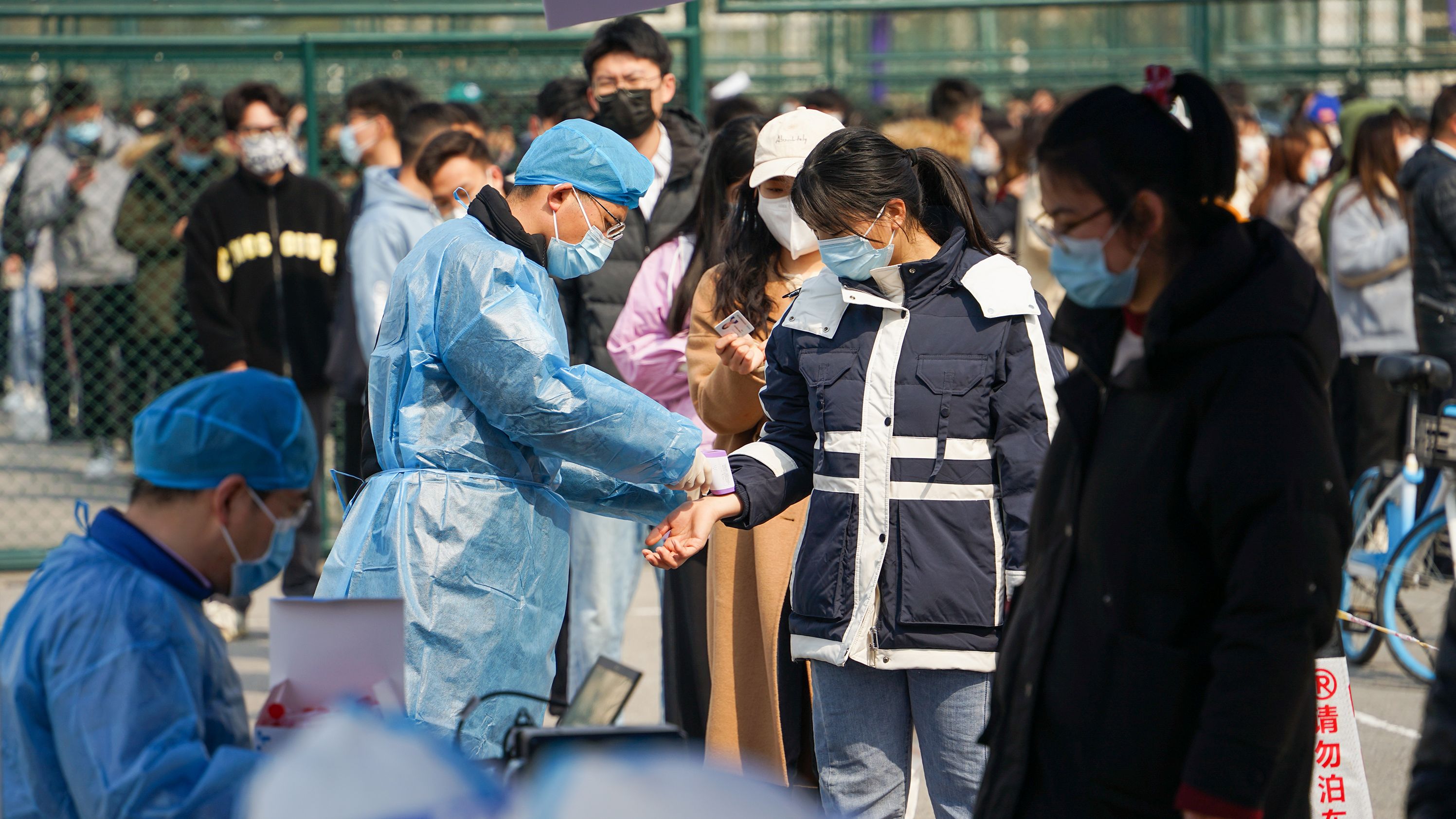 Students line up for Covid-19 testing at Qingdao Agricultural University on March 7 in China's Qingdao city.