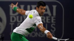 DUBAI, UNITED ARAB EMIRATES - FEBRUARY 23: Novak Djokovic of Serbia returns the ball in the second round match against Karen Khachanov of Russia during day 10 of the Dubai Duty Free Tennis at Dubai Duty Free Tennis Stadium on February 23, 2022 in Dubai, United Arab Emirates. (Photo by Martin Dokoupil/Getty Images)