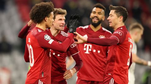 Leroy Sané celebrates scoring Bayern's seventh goal on the night with his teammates.