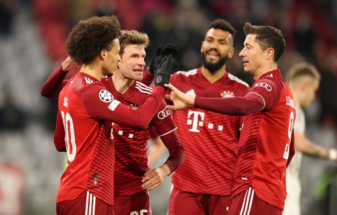 Leroy Sané celebrates scoring Bayern's seventh goal on the night with his teammates.