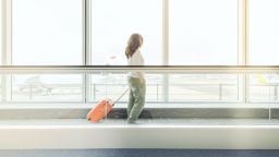 underscored travel pants lead woman airport