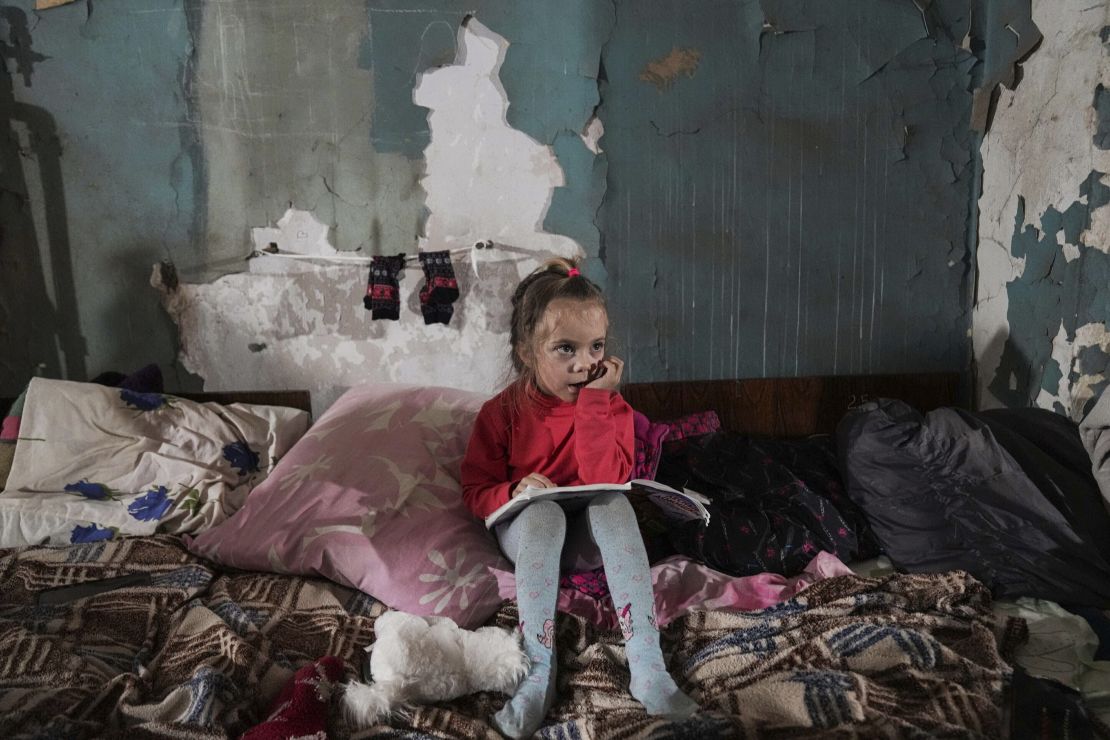 A young girl pictured in a shelter in Mariupol.