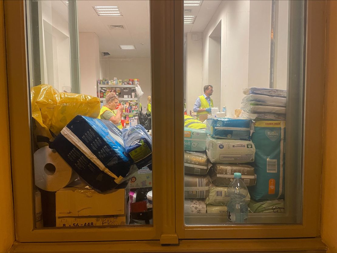  Diapers, baby wipes and food items fill a room inside the Przemyśl train station.