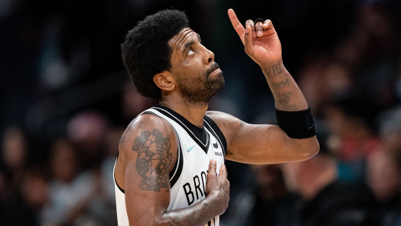 Kyrie Irving celebrates during the fourth quarter of the Brooklyn Nets' game against the Charlotte Hornets.
