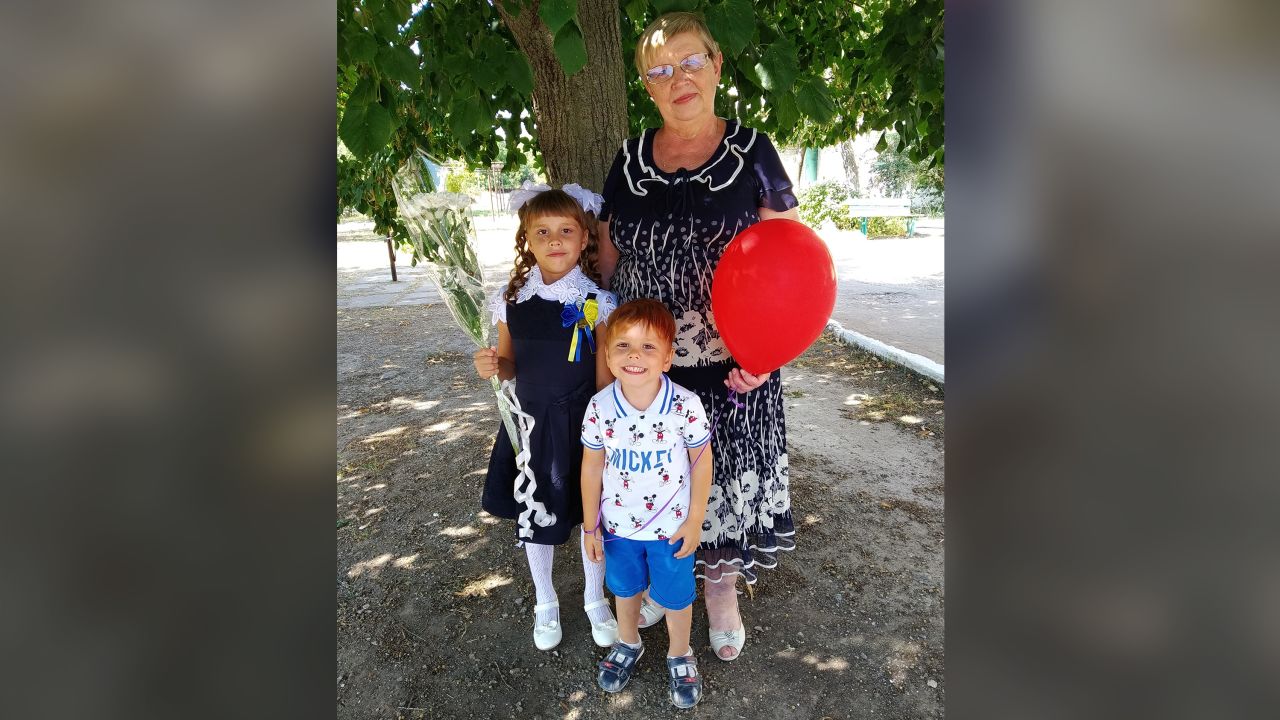 Iryna Lytvyn's mother -- who she has lost contact with in a besieged Ukrainian city -- with her grandchildren before Moscow's brutal invasion ripped the family apart.