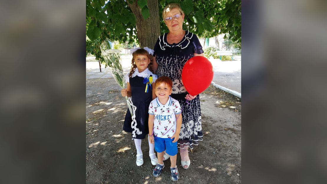 Iryna Lytvyn's mother -- who she has lost contact with in a besieged Ukrainian city -- with her grandchildren before Moscow's brutal invasion ripped the family apart.