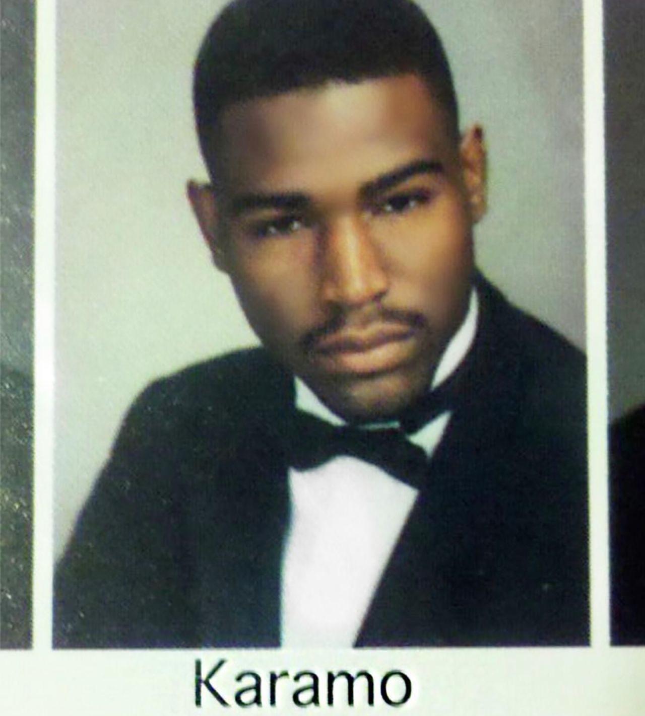 Brown pictured with a full head of hair in his yearbook photo.