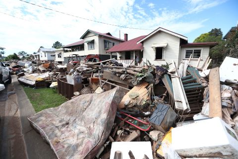 Debris is seen scattered outside homes in South Lismore, Australia, on March 9.