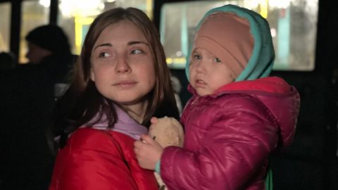 Krystina Ponomaryova, 21, and her two-year-old daughter Angelina after getting off the bus that brought them to safety. 