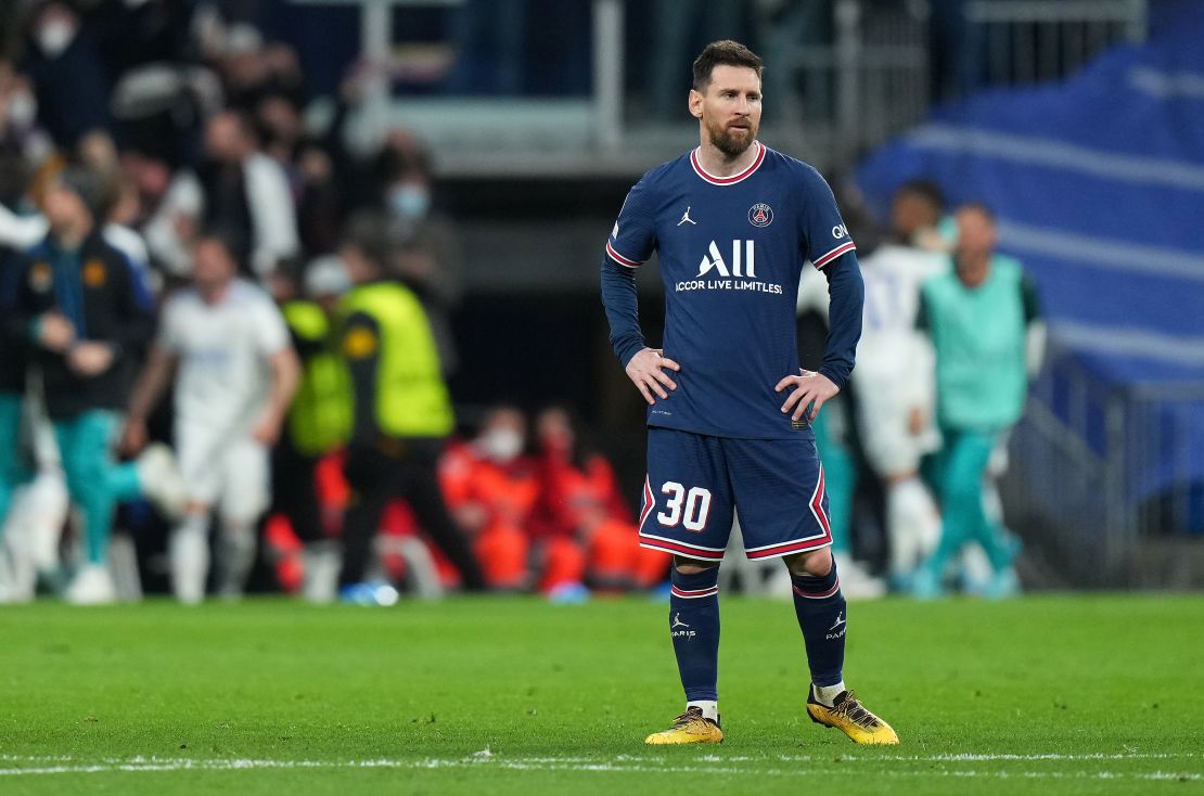 Lionel Messi cuts a dejected figure as PSG lets the lead slip. 