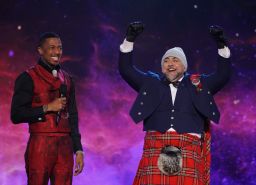 Host Nick Cannon and Duff Goldman in the premiere episode of The Masked Singer airing on March 9.