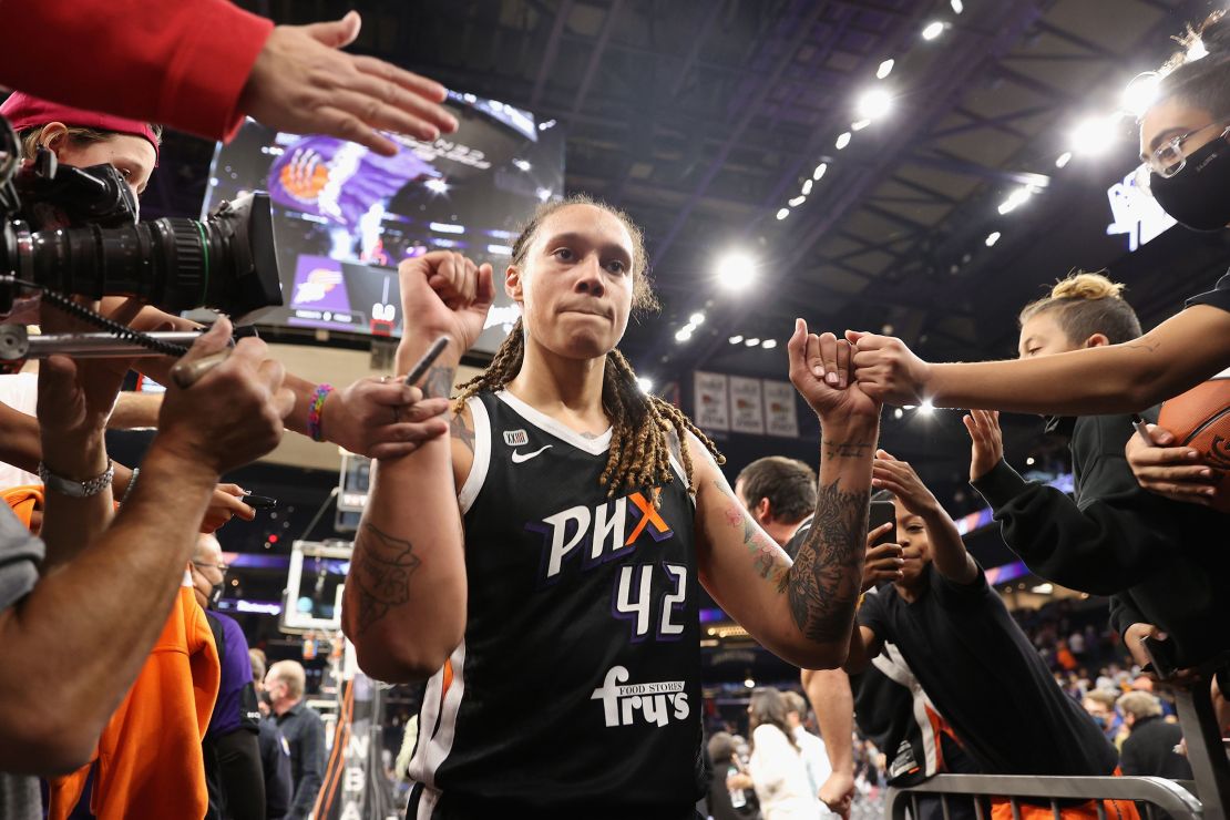 Brittney Griner #42 of the Phoenix Mercury celebrates with fans following Game Two of the 2021 WNBA Finals at Footprint Center on October 13, 2021 in Phoenix, Arizona. The Mercury defeated the Sky 91-86 in overtime.