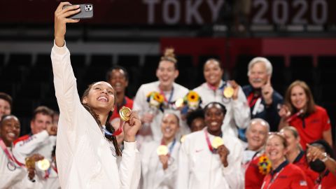 Brittney Griner #15 of Team United States takes a selfie with her teammates and their gold medals during the Women's Basketball medal ceremony on day sixteen of the 2020 Tokyo Olympic games at Saitama Super Arena on August 08, 2021 in Saitama, Japan. 