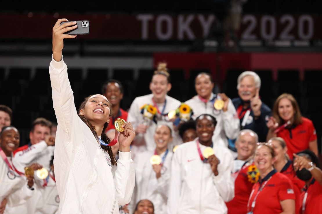 Brittney Griner #15 of Team United States takes a selfie with her teammates and their gold medals during the Women's Basketball medal ceremony on day sixteen of the 2020 Tokyo Olympic games at Saitama Super Arena on August 08, 2021 in Saitama, Japan. 