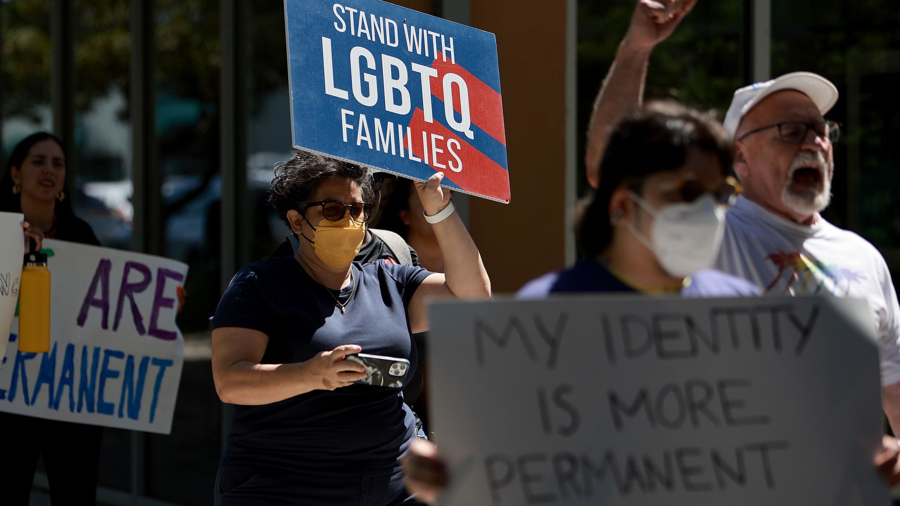 People protest in front of Florida State Senator Ileana Garcia's office after the passage of the Parental Rights in Education bill, dubbed the "Don't Say Gay" bill by LGBTQ activists, on March 09, 2022, in Miami, Florida.