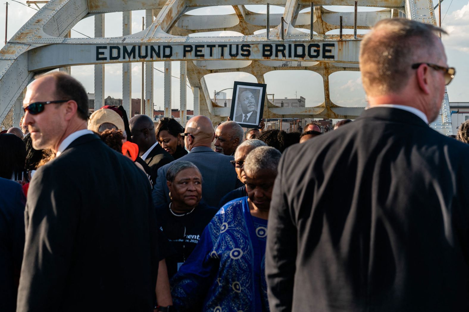 A photo of Martin Luther King Jr. is held up during a march across the Edmund Pettus Bridge in Selma, Alabama, on Sunday, March 6. It was the 57th anniversary of the "Bloody Sunday" incident, which is when Alabama state troopers violently ended a civil rights march from Selma to Montgomery in 1965. Two days later, King led a symbolic march to the bridge.