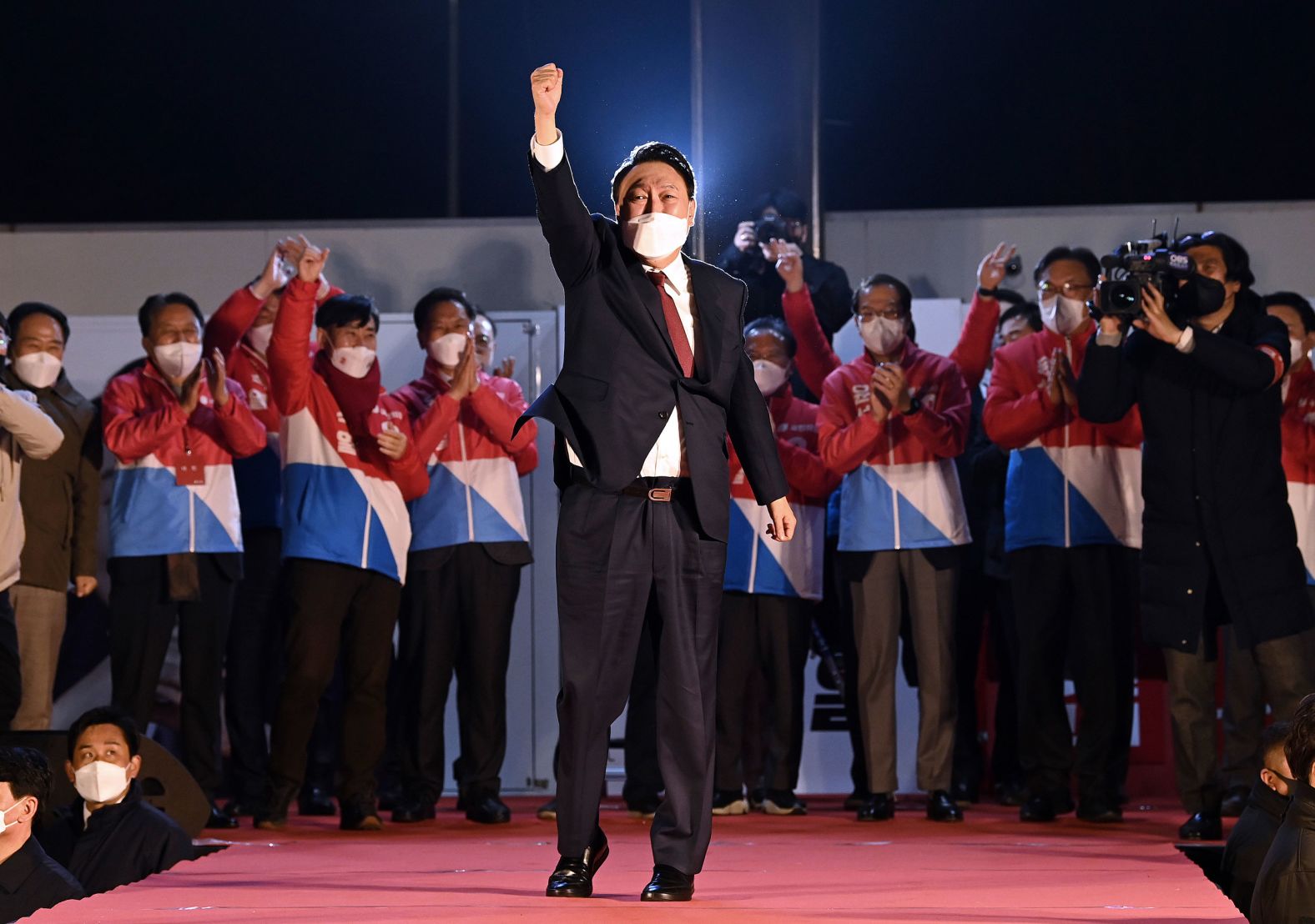 South Korean President-elect Yoon Suk Yeol celebrates at his party headquarters in Seoul on Thursday, March 10. The conservative <a href="index.php?page=&url=https%3A%2F%2Fwww.cnn.com%2F2022%2F03%2F09%2Fasia%2Fsouth-korea-yoon-suk-yeol-election-intl%2Findex.html" target="_blank">narrowly defeated Lee Jae-myung</a> from the ruling Democratic Party.