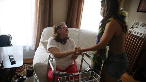Medical recognition of post-Covid conditions is driving new research into the long-term effects of infection. (From left) After hospitalization for over 70 days due to Covid-19, Nina Coletta, shown with her daughter, Gabriela, returns home in East Boston, Massachusetts, on June 23, 2020.