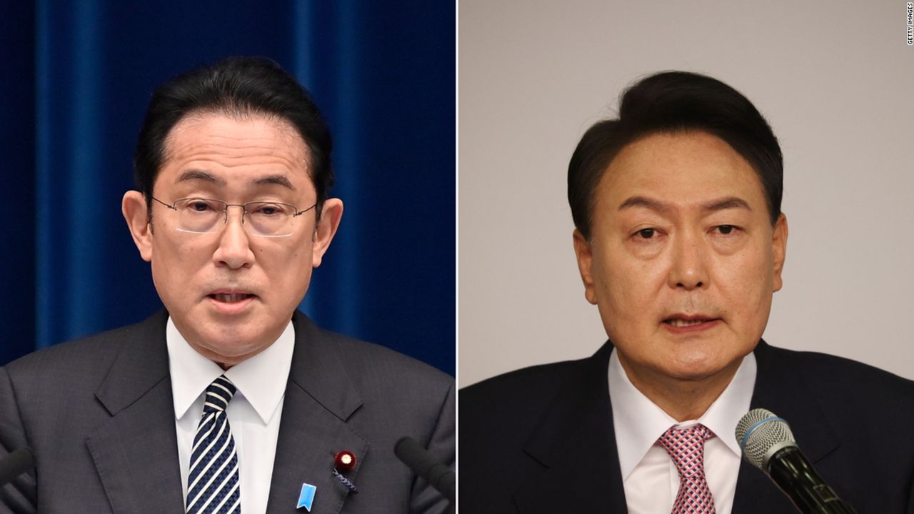 Japanese Prime Minister Fumio Kishida, left, and South Korean president-elect Yoon Suk-yeol