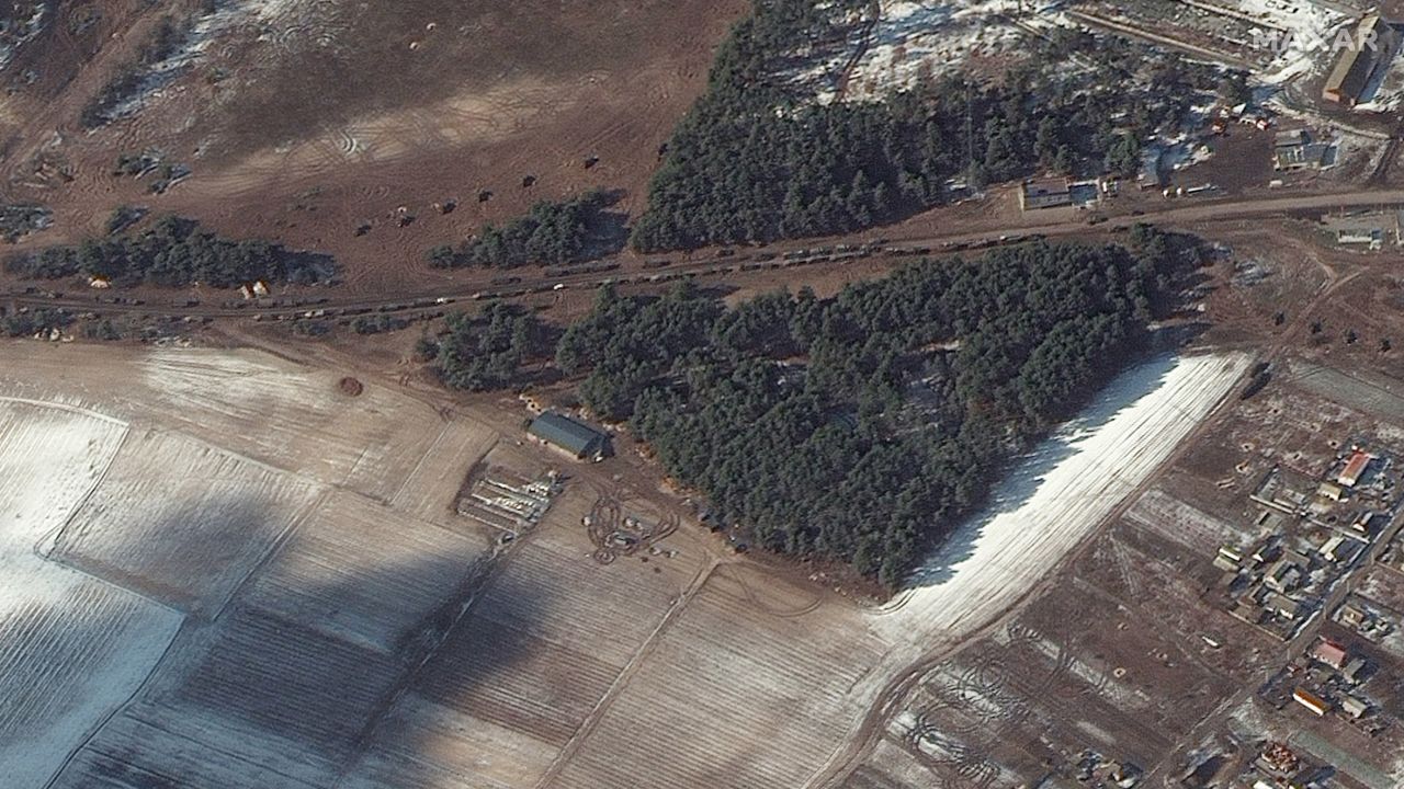 Several fuel trucks and what Maxar says appear to be multiple rocket launchers are seen positioned in a field in Berestyanka.