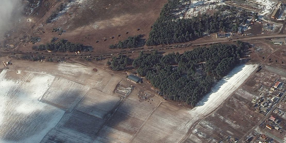 Several fuel trucks and what Maxar says appear to be multiple rocket launchers are seen positioned in a field in Berestyanka.